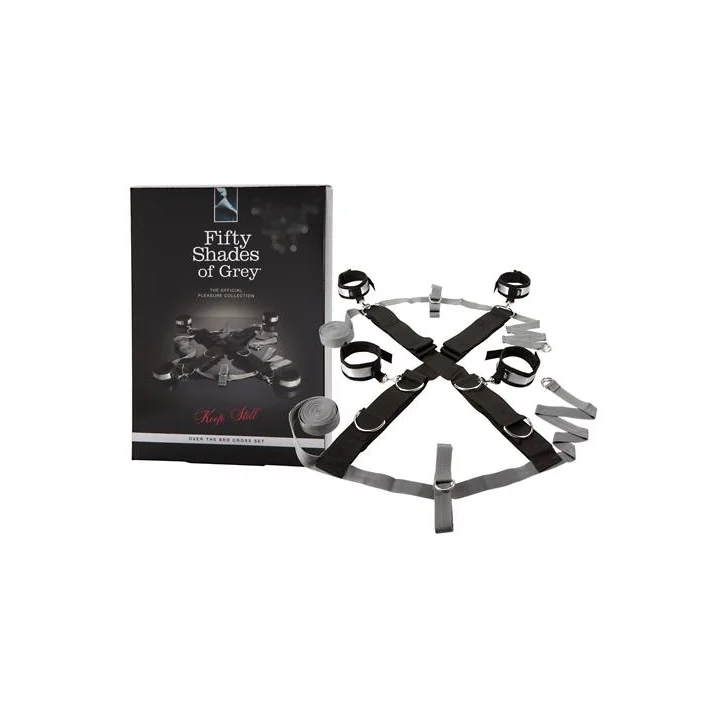 Černé a šedé poutací pásy Fifty Shades of Grey Keep Still vedle černé krabičky